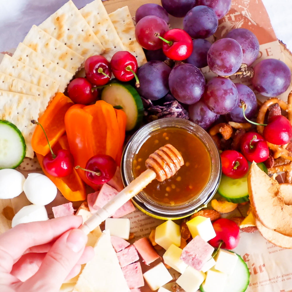 Elevate Your Cheese Board with Alexandra's Pikliz Infused Hot Honey